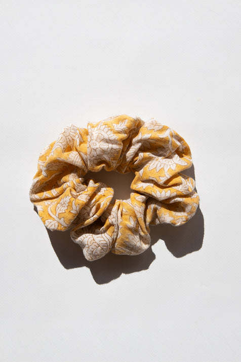 Daughters of India Upcycled Scrunchie in Turmeric, a golden yellow hair scrunchie made from upcycled cotton fabric